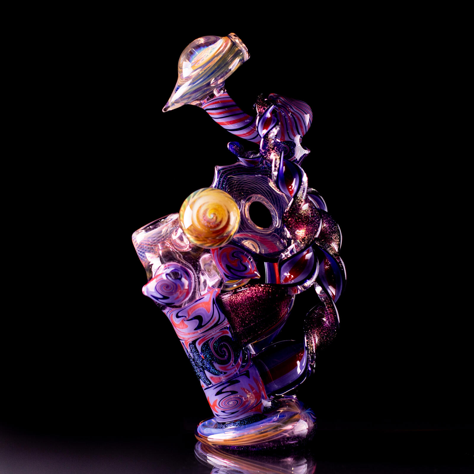 Bubbler with discs and swirls